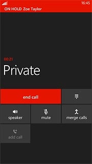 Make sure the call you want to end is active.Press end call.The active call is ended and the call on hold is automatically activated.