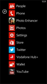 Slide your finger left on the display.Press Photos.