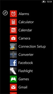 Slide your finger left on the display.Press Alarms.