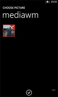 When the picture is ticked (V), it's selected.