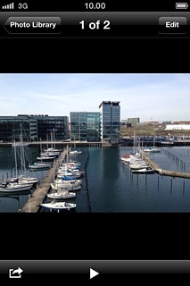 Press the field in the top left corner of the display to return to the list of pictures and video clips.