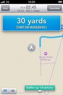 If required, press anywhere on the display.The navigation window with information about your route is displayed.The time of arrival, travel time, distance and the next step are displayed at the top of the display.Follow the verbal instructions or the instructions on the display to go to the selected destination.