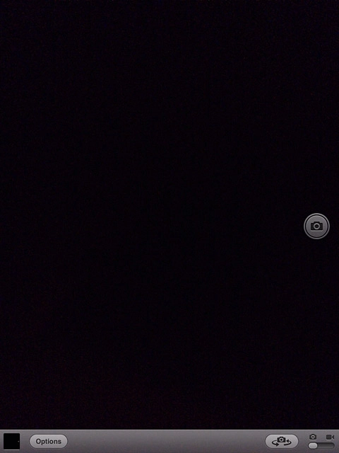 To turn grid on or off:Press Options.