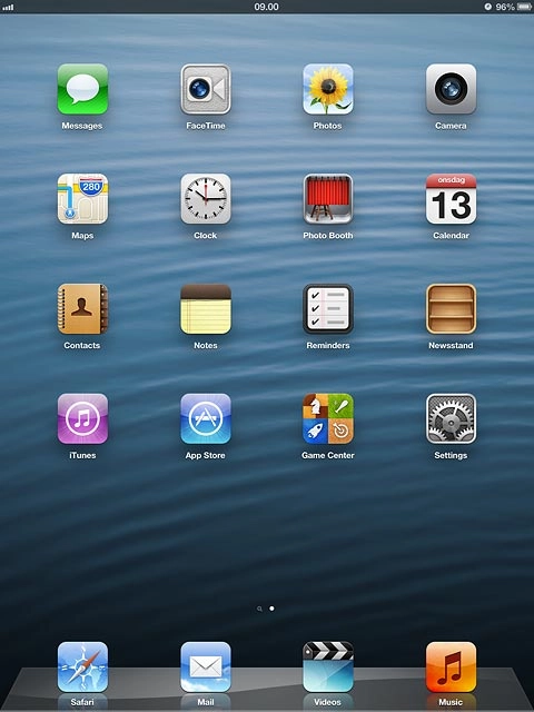 The alarm icon shows that the alarm is set.Further information:Set the alarm