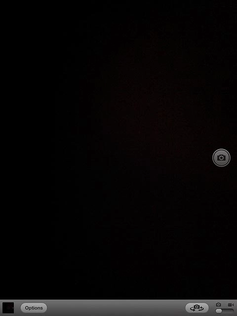 If the camera is turned on:Press the indicator in the bottom right corner of the display and drag it right.