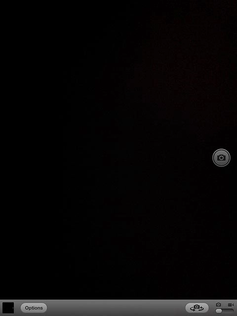 To turn grid on or off:Press Options.