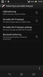 When the box next to the menu item is ticked (V), the Wi-Fi hotspot is turned on.