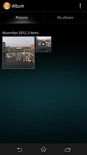 Press and hold the required picture or the required video clip to select it.
