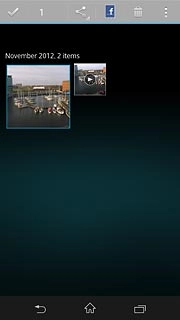 When a picture or video clip is displayed in a blue frame, it's selected.