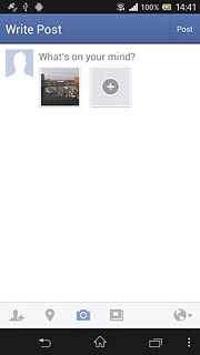 Key in text for the picture or the video clip.Press Post.