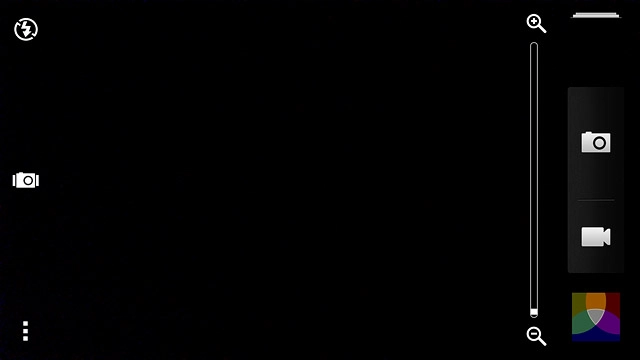 Press and drag the indicator up or down to zoom in or out.