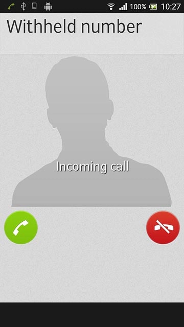 Press the reject call icon and drag the icon left.