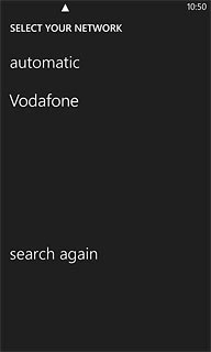 Press automatic.Wait while your phone finds the network.