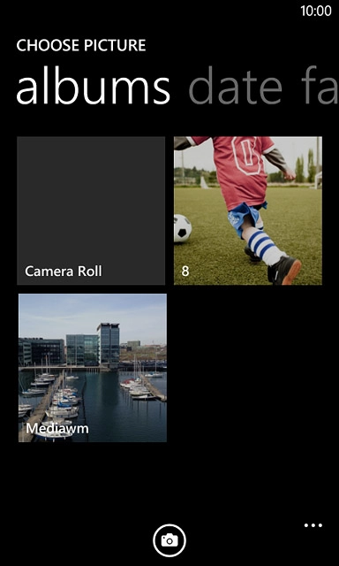 To take a new picture:Press the camera icon.