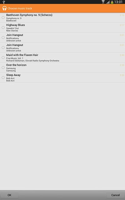 Go to the required folder.Press the different ring tones to listen to them.