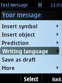 Scroll to Writing language and press the Navigation key.