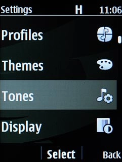 Scroll to Tones and press the Navigation key.