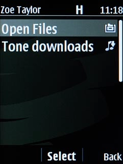 Scroll to Open Files and press the Navigation key.Go to the required folder.