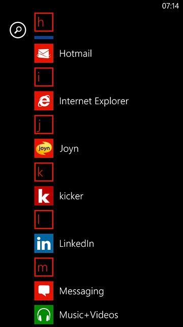 Slide your finger left across the display to open the main menu.Press Music+Videos.