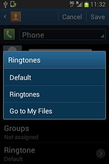 To assign your phone's current default ring tone:Press Default.
