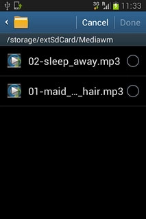 Go to the required folder.Press the different ring tones to listen to them.