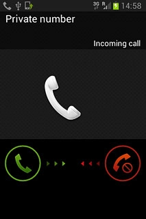 Press and drag the reject call icon left.