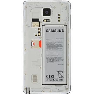 Place the battery in your phone, top first, matching the battery contacts with the phone contacts and press the battery into place.