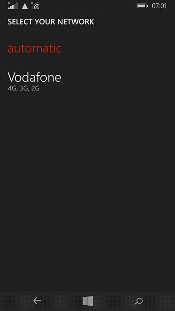 Press automatic.Wait while your phone finds the network.