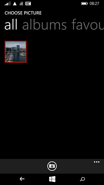 To take a new picture:Press the camera icon.