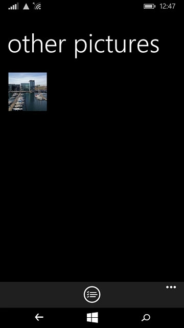 Go to the required folder.Press and hold the required file until a pop-up menu is displayed.