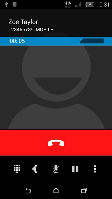 Press the end call icon.