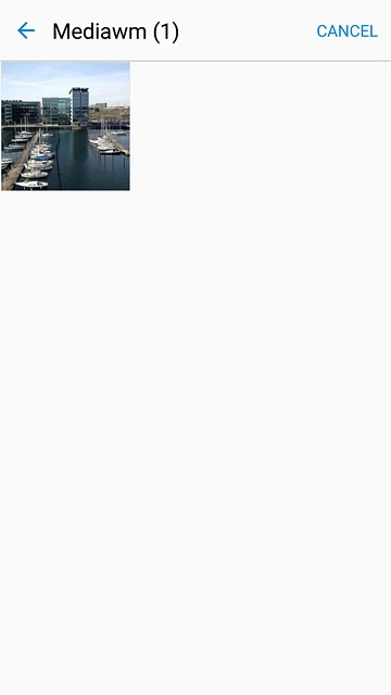 Go to the required folder.Press the required picture.