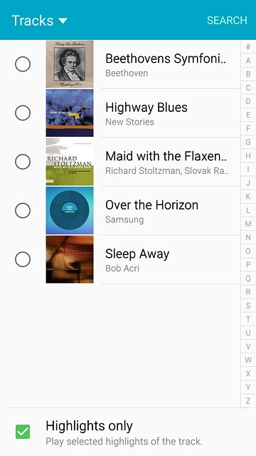 Go to the required folder.Press the different ring tones to listen to them.