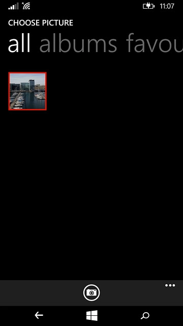 To take a new picture:Press the camera icon.