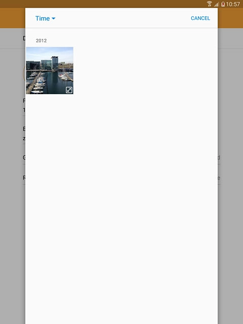 Go to the required folder.Press the required picture.