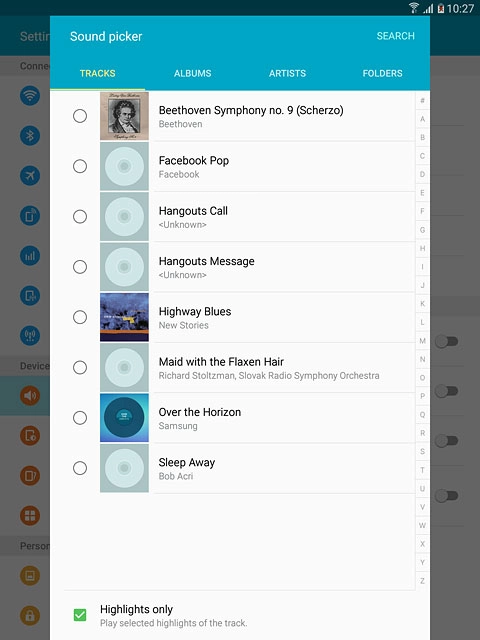 Go to the required folder.Press the different ring tones to listen to them.