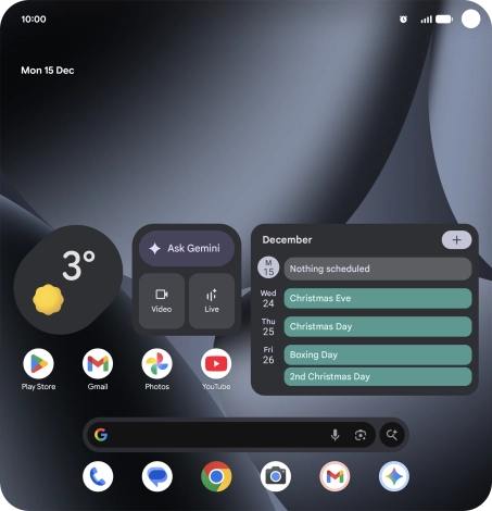 The alarm icon shows that the alarm is set.