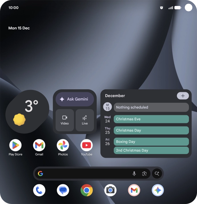 The alarm icon shows that the alarm is set.
