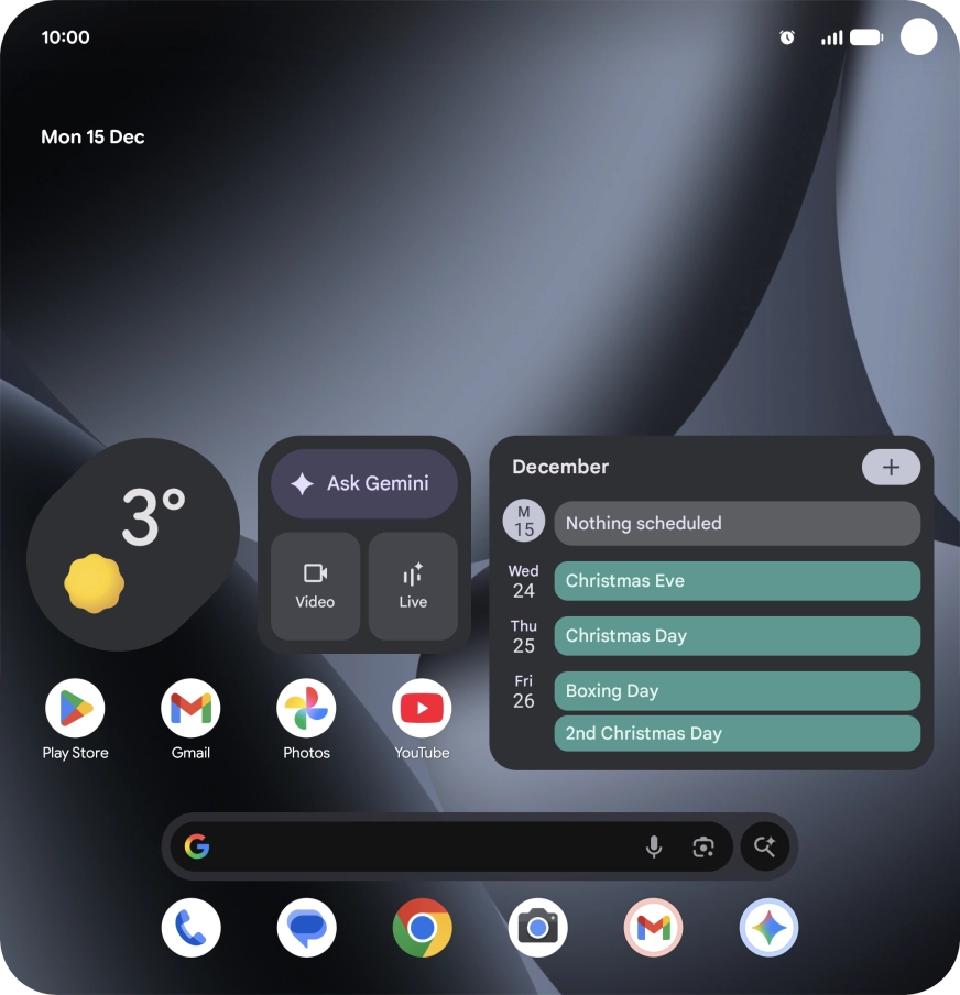 The alarm icon shows that the alarm is set.