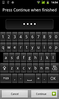 Key in the required phone lock code and press Continue.