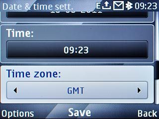 Scroll to Time zone and press Navigation key right to select the required time zone.