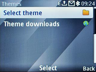 Scroll to Select theme and press the Navigation key.Go to the required folder.