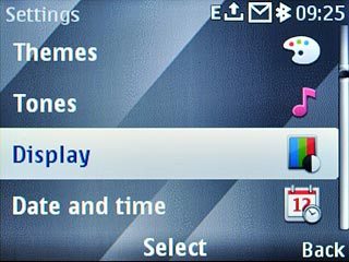 Scroll to Display and press the Navigation key.