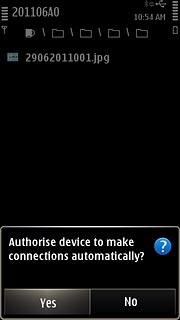 Press Yes or No to select automatic connection when the devices are turned on.You also need to accept the transfer on the other device.The file is sent.