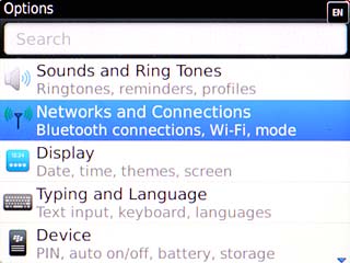 Scroll to Networks and Connections and press the Navigation key.