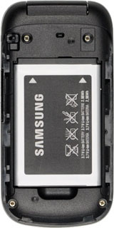 Take hold of the bottom of the battery and remove it.