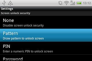 Press Pattern.Press a point and drag it to connect at least four points to create a new phone lock code.