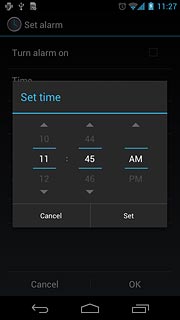 Press hours and minutes and slide your finger up or down to set the time.
