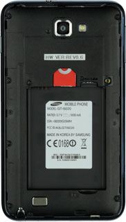 Place your SIM in the SIM holder and slide it in.