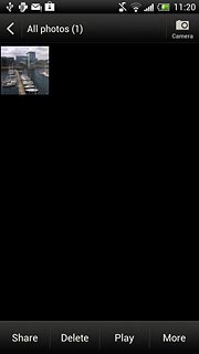 Go to the required folder.Press and hold the required picture or the required video clip until a pop-up menu is displayed.